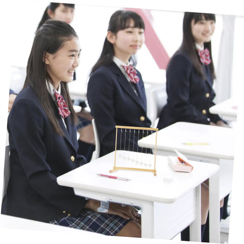 Students engaging with DIY Snake Shape Pendulum Energy Conservation Science Kit For Hands On Projects And Experiments in class.