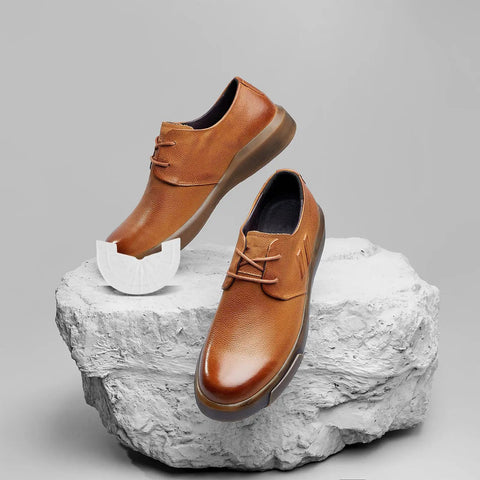 Premium Rubber Sole Protectors For Sneakers And Boots With 4mm Anti Scuff Heel Pads on brown casual shoes on display.