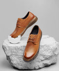 Rubber Shoe Heel Repair Pads 4mm White 1 Pair Boosts Traction And Stops Squeaks Made With Flexible Abrasion Resistant Material For Sneakers And Shoes With Effortless Application To Shield Soles From Wear While Keeping Your Steps Grippy And Secure For, shown near brown leather shoes on stone.