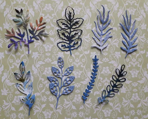 Eight Piece Leaf Metal Die Cuts Set For Scrapbooking And Card Making, Floral Leaf Cutting Dies Stencils For DIY Embossing Craft Projects, Durable Carbon Steel Dies, 9.7 By 10.9 Cm displayed on floral background.
