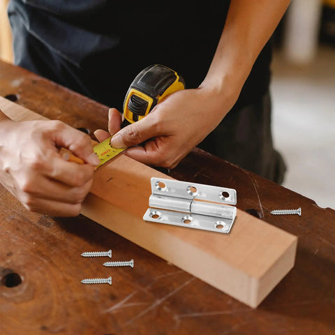 Person using tape measure with 4 Pack Stainless Steel Lift Off Door Hinges For Doors, Windows, And Shoe Cabinets on wood
