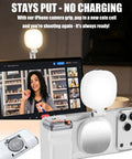 Phone Camera Grip With Light And Wireless Remote, featuring magnetic ring and LED selfie light for content creation on phones.