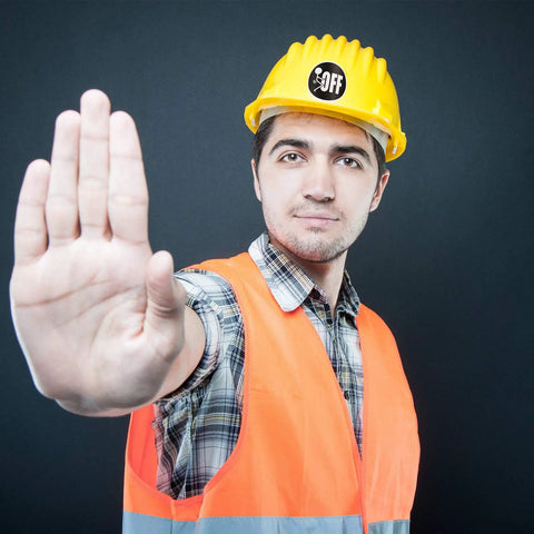 Person wearing yellow helmet with "OFF" sticker from Hard Hat Sticker Pack For Adults, 300 Pcs Funny Toolbox Decals.