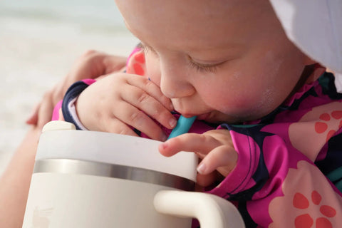 Child using Extra Long 12 Inch Silicone Reusable Straws For Tall Size Tumblers With Included Cleaning Tool BPA Free Flexible Straws