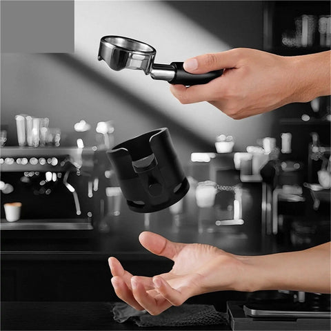 Boss Level 58Mm Espresso Tamping Station With Slick Anti Slip Base And Quick Adjustable Frame For Hassle Free Coffee Tamping Plus Nifty Grounds Catch Tray in use, handheld.