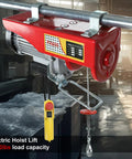 Heavy-Duty Electric Hoist Lift 1320 Lb Capacity With Remote Control 110V Winch Steel Wire Overhead Crane in a workshop