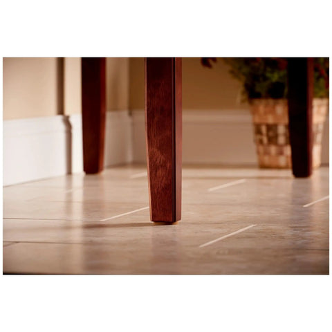 Heavy Duty Self Adhesive Gripping Pads For Hard Surfaces One And A Half Inch Brown 8 Count No Slip Furniture Grippers on table leg