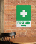 Right Arrow Green First Aid Sign 8x12 Inches Weatherproof Reflective Aluminum Plate on brick wall