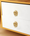 Gold Brass Peony Flower Cabinet Knobs And Drawer Pull Handles For Kitchen Bathroom Bedroom Furniture Hardware Vintage Copper Finish With Elegant Floral Design For Rustic And Modern Decor installed on a white drawer
