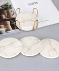 6 Pack White Marble Coaster Set With Holder, Absorbent Ceramic Drink Coasters for Bar and Coffee Table on magazine