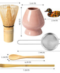 Pink Matcha Whisk Set With Chasen Holder And Ceramic Stand includes bamboo scoop, fine mesh sifter, and tea tools shown with dimensions.