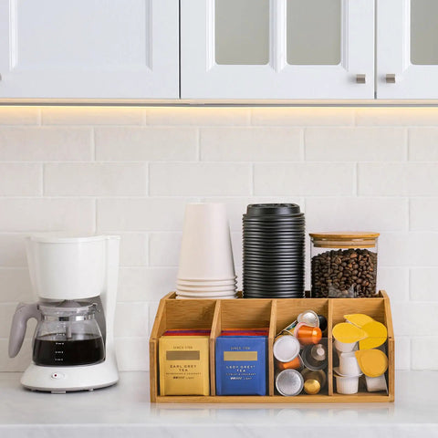 Bamboo Coffee Station Organizer With Clear Acrylic Tray Five Compartment Design For Tea Bags Condiments Pods Creamer Syrup And Cups on countertop.