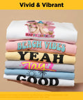 Stack of T-shirts with vibrant designs using Light Fabric Printable Heat Transfer Paper For Inkjet And Laser Printers 10 Sheets 8 By 11 Inches Easy Iron On HTV Transfer Paper For T Shirts Cold Water Washable Crazy Vibrant Colors For Light Fabrics.