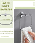 Slick Premium Chrome Square Hand Towel Ring For Bathroom Sink Wall Mounted Heavy Duty Rust Resistant Quick Dry Space Saver Solid Bracket Tight Pro Style with a towel.