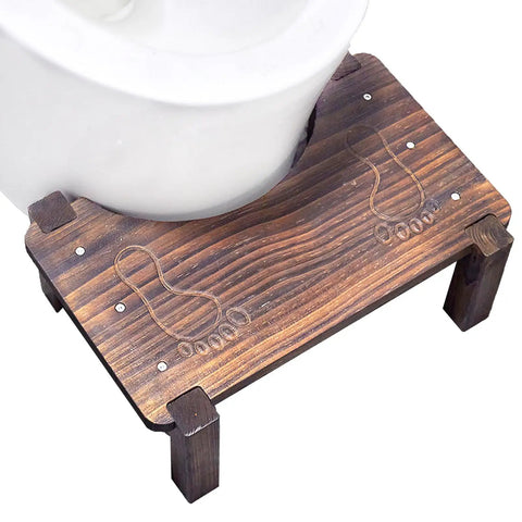 Wooden 7 Inch Squatting Toilet Stool for Adults with foot pad and anti-slip design, shown under a toilet for natural posture support.