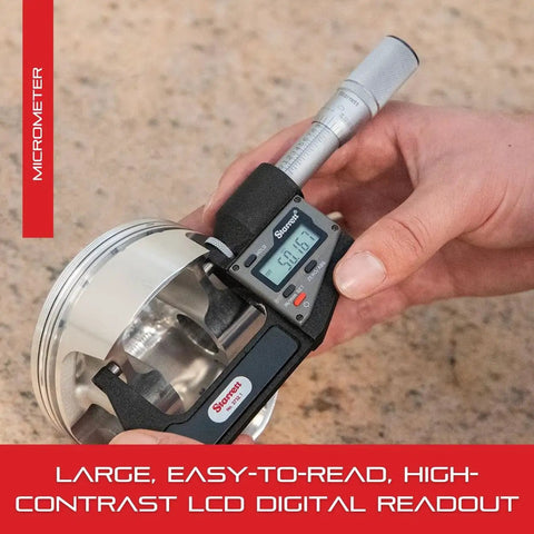 Electronic Inch And Metric Micrometer With Easy LCD Readout measuring metal object, 1 To 2 Inch Range, 0.00005 Inch Resolution