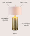 Gold Modern Resin Table Lamp 30 Inch Tall With White Linen Drum Shade Glam Contemporary Bedside Light For Living Room And Bedroom UL Listed LED Bulb Included Easy Plug In Vibe, features resin base and linen shade.