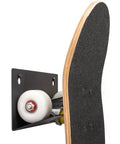 Heavy Duty Steel Skateboard Wall Mount Rack Secures Decks For Garage Storage Rad Display Setup and Shields Boards From Nasty Floor Scuffs While Daily Rolling, showing skateboard mounted upside down.