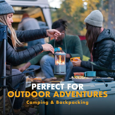 Person holding Red Candle Lantern For Camping And Emergencies, A Must-Have For Backcountry Prep, Lets You Run 3 Nine-Hour Emergency Candles