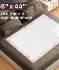 Top Shelf Extra Large Disposable Adult Bed Pads, 36 By 44 Inch Super Absorbent Underpads on bed for overnight protection.