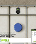Pro200 Ultrasonic Tank Level Sensor with Bluetooth and wired connectivity on tank, app interface visible on smartphone