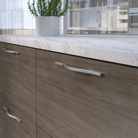 Brushed Nickel Modern Arched Cabinet And Drawer Pull Handle for kitchen and bath, installed on wooden cabinets.