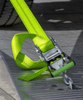 Eight Point Vehicle Tie Down Kit With Snap Hook Ends And Chain Tail on metal surface