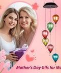 Solar Wind Chimes Outdoor Lights With 30 Warm White LEDs Hot Air Balloon Style Hanging Decor displayed as gift for Mother's Day.