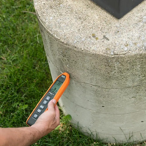 Advanced Underground Circuit Breaker Finder And Wire Tracer Kit in use on cement block, showcasing adjustable sensitivity for wall tracing