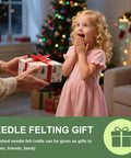 Child receiving a gift with a Christmas tree in the background, perfect timing for needle felting gift projects.