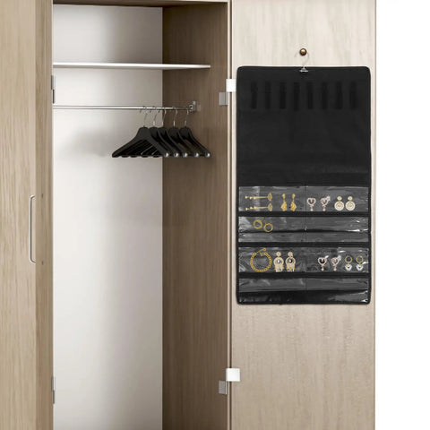 Double Sided Jewelry Hanging Storage Organizer Bag For Closet With Pouch Keeps Watches Ties Hair Accessories Locked Away For Hella Neat Dresser Vibes Forever hanging on a closet door.