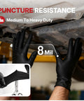 Heavy Duty Nitrile Work Gloves 8 Mil Thick Tough As Nails Textured Grain Grip Powder And Latex Free Job Site Ready Industrial Safety Gloves Black Large 100 Pack worn while working under a vehicle.