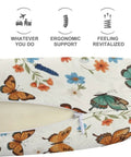 Cozy On The Go Neck Pillow For Women Multi Functional Travel Pillow For Sleeping And Napping Office And Home Comfort Soft Plush Polyester Colorful Butterfly Flowers Theme with ergonomic support symbols above.