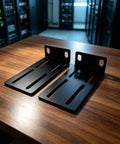 Rock Solid 1U Adjustable Rack Mount Pair For 19 Inch Server Cabinets Heavy Duty Steel Brackets on a wooden table.