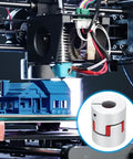 Aluminum shaft coupling (10mm–10mm, flexible spider) mounted on a 3D printer; inset shows white cylindrical coupling with red slots.
