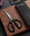 8.4 Inch Titanium Plated Heavy Duty Kitchen Scissors With Detachable Blades Rust Resistant 5Cr15MoV Stainless Steel 57HRC Hardness Cut Like A Boss Through Poultry Meat Seafood And Veggies, shown on cutting board