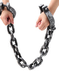 Person holding Halloween Plastic Wrist Shackles Handcuffs with Chain Links for Cosplay and Party Decor, 35 inch black prop