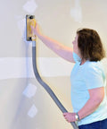 Person using Dust Free Drywall Vacuum Hand Sander With Six Foot Hose For Any Wet Dry Vacuum Easy Clamp Sanding Screen Replacement