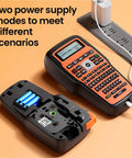Slick E1000 Pro Handheld Portable Label Printer For Fast Industrial Marking On Multiple Surfaces With Hella Efficient Personalized Adhesive Labels And Boss Level Workspace Organization Tool In Classic Gray, showing battery compartment and power cord.