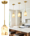 Karjearl Alabaster Pendant Lights Kitchen Island, Modern Gold Hanging Light over a kitchen island with natural alabaster shade.