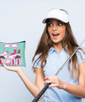 Woman holding 9 Piece Golf Gift Cosmetic Bags Set For Women with golf cart design, wearing visor, casual polo, holding golf club