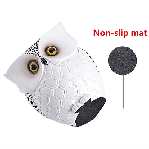 Bottom view of the Dope Owl Pen Holder And Desk Organizer For Pens And Pencils showing non-slip mat, white ceramic finish with carving.