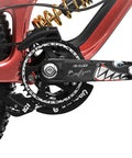 Close-up of bike crankset with Dual Pack Mountain Bike Frame Protectors Stickers for Crankset and Handlebar one pair 14 by 5.5 cm black