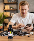 Man using Screen Repair Liquid No Fuss Quick Fix For Phones Tablets And Eyeglasses That Restores Scratches And Smoothes Glass