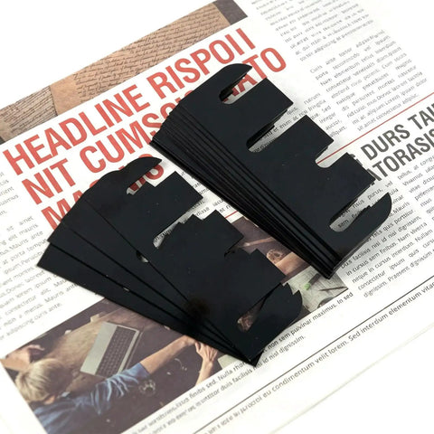 30 Pack 4 Inch Door Hinge Shims Kit For Quick Adjustment shown stacked on a newspaper