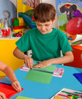 Child using 12 Inch Titanium Paper Cutter With Side Ruler For Scrapbooking And Crafting No Fuss Paper Trimmer Guillotine