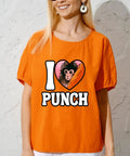 Woman wearing orange shirt with "I Love Punch" design, featuring Dope Monkey Heart graphic, part of DTF Transfers Pack For T Shirts 7x7.