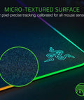 Close-up of Hard RGB Gaming Mouse Pad V2 With Customizable Chroma Lighting, showcasing micro-textured surface for precision.