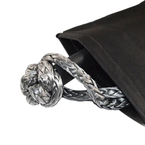 Close-up of 3/8 inch synthetic recovery shackle with 24,200 lbs breaking strength, featuring protective sleeve and UHMWPE rope.