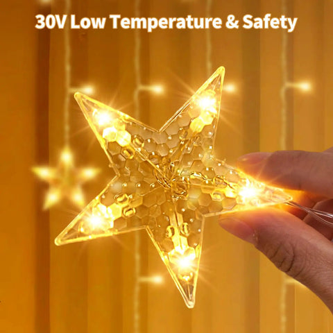 Close-up of Dazzle Bright Ramadan Curtain String Lights With 138 LEDs Warm White Star Moon Fairy Lights held in hand